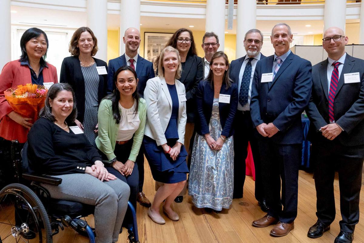 2026 Teaching Awards recipients posing together in the Rotunda's Dome Room at the Teaching Awards ceremony.